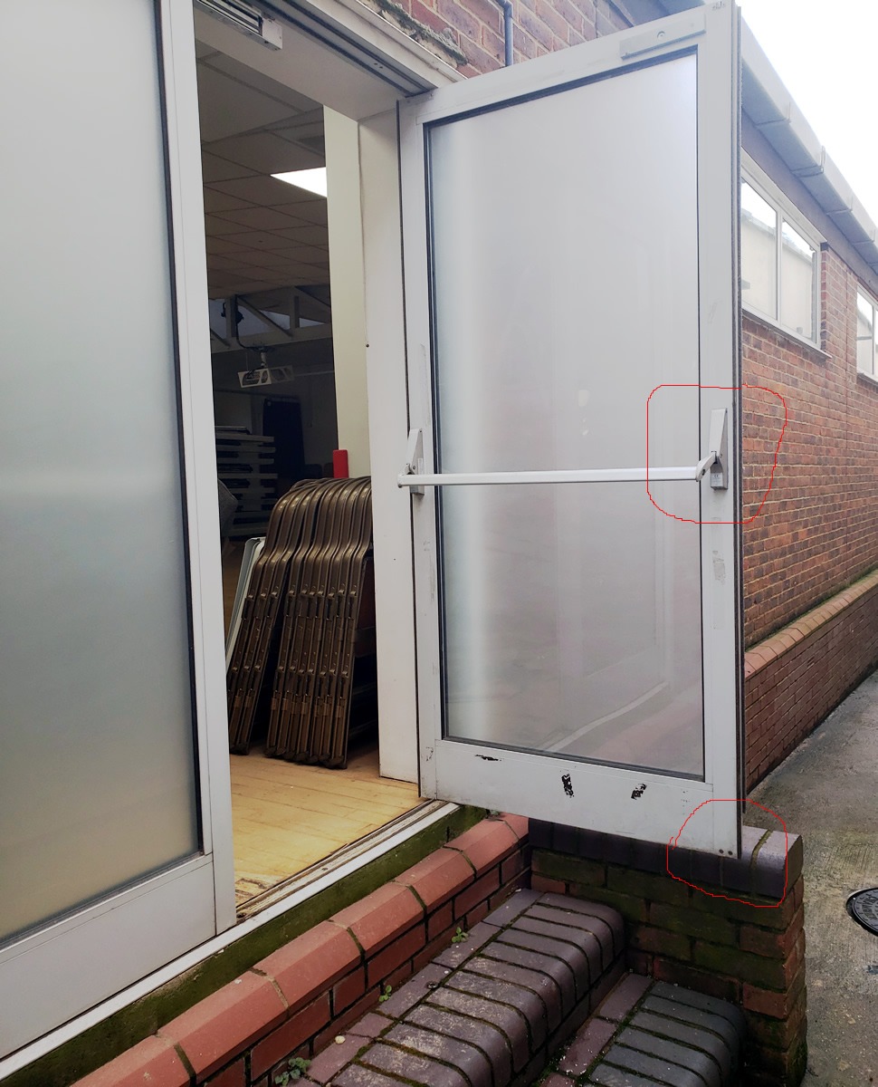 Hall fire exit glass door